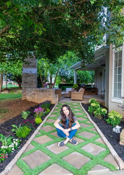 Paver walkway and landscaped outdoor space